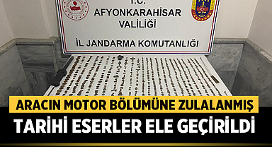 Afyonkarahisar'da aracın motor bölümüne zulalanmış tarihi eserler ele geçirildi
