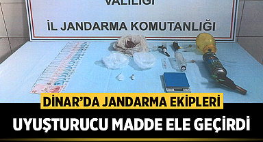 Dinar'da bir evde arama yapan Jandarma ekipleri uyuşturucu madde ele geçirdi