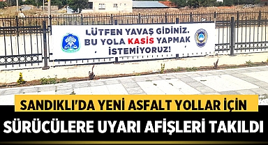 Sandıklı'da Yeni Asfalt Yollar İçin Sürücülere Uyarı Afişleri Takıldı