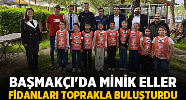Başmakçı'da Minik Eller Fidanları Toprakla Buluşturdu
