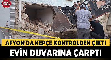 Afyon'da Kepçe Kontrolden Çıktı, Evin Duvarına Çarptı