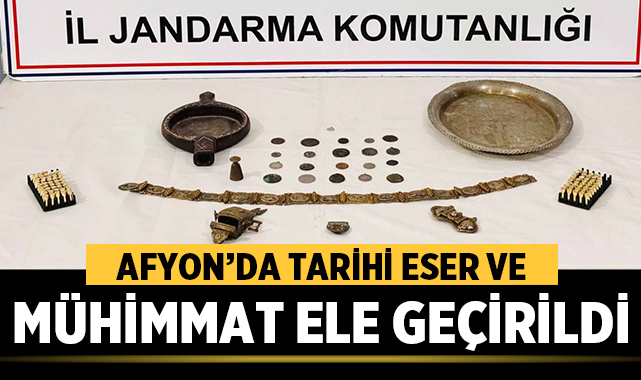 Afyon’da tarihi eser ve mühimmat ele geçirildi