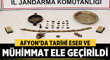 Afyon’da tarihi eser ve mühimmat ele geçirildi