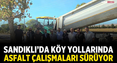 Sandıklı'da köy yollarında asfalt çalışmaları sürüyor