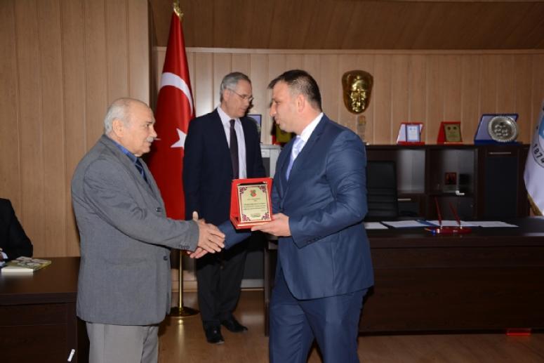 YAZARIMIZ KALKAN’A 2 PLAKET